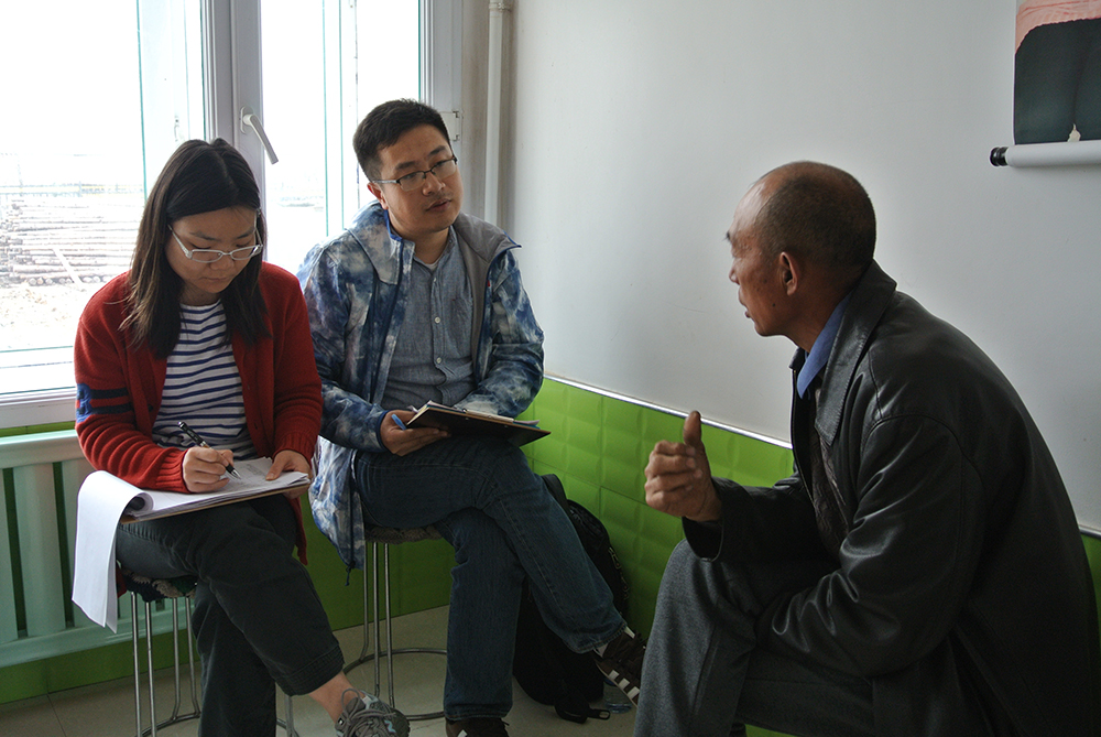 Jing Sun and Yue Doe interview farmers in Heilongjiang, China