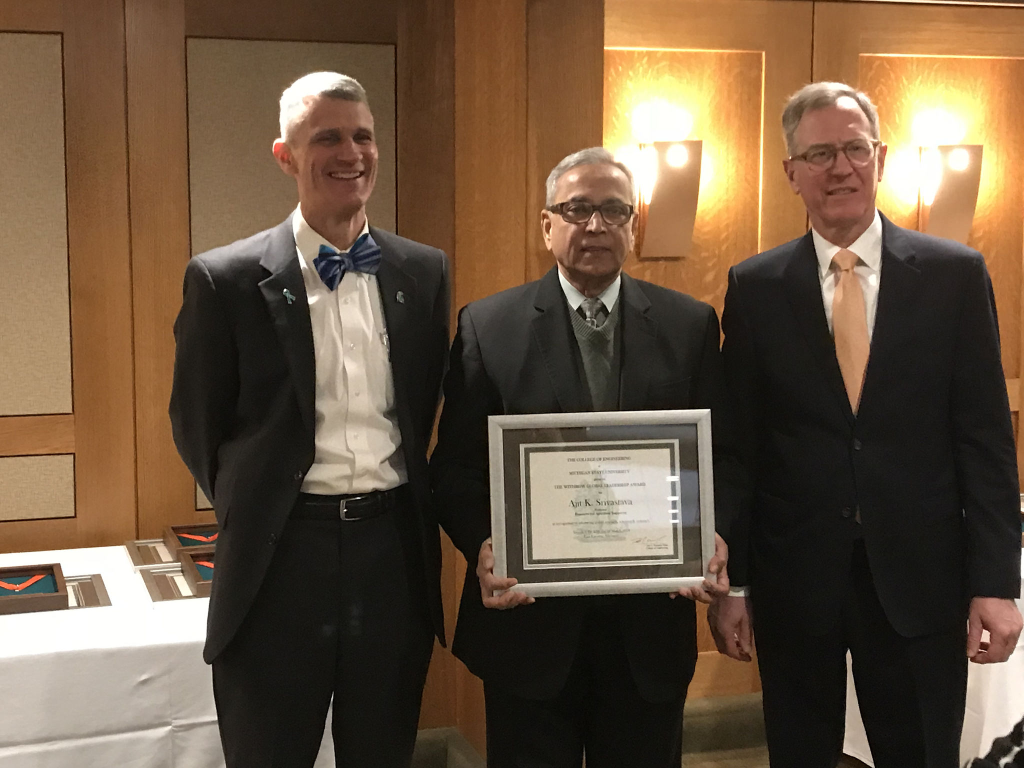 Photo of Dr. Srivastava Receiving Withrow Endowed Global Leadership Award