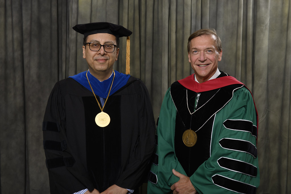 Photo of Dr. Pouyan Nejadhashemi, 2019 MSU Foundation Professor, with MSU President Samuel L. Stanley Jr., M.D.