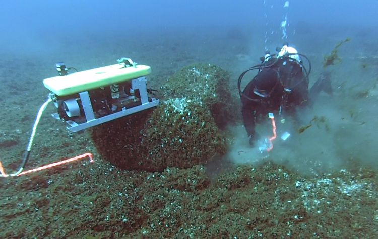Diver and MSU alum Tyler Schultz and 'Jake' the ROV collect samples in central Lake Huron. Photo: John O’Shea | University of Michigan Museum of Anthropologial Archaeology