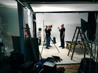 Rufus Isaacs and Tom Gennera take photos.