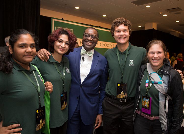 Nathan Laurenz (second from right) with His Excellency Dr. Akinwumi A. Adesina, President, African Development Bank Group.