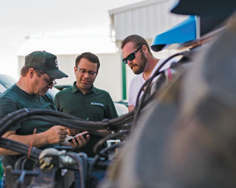 Kalvin Canfield, (right) is a graduate student working with Maninder Singh, an assistant professor in the MSU Department of Plant, Soil and Microbial Sciences, on precision planting in wheat. Dennis Pennington (left) is a wheat systems specialist with MSU Extension and MSU AgBioResearch.