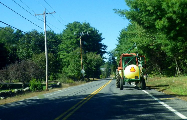 Motorists and farmers can share the road and prevent traffic collisions involving farm equipment. Photo credit: BEV Norton, Flickr.com