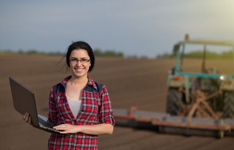 A young farmer in her field.