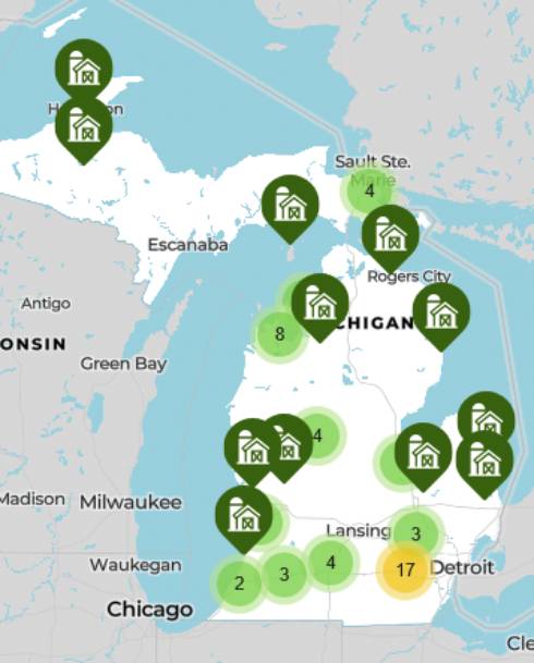 Map of Michigan showing land available through MI FarmLink as Green icons. Some icons have a number to show you to zoom in to see multiple farmsites.