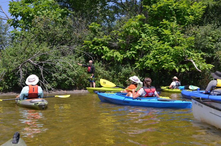 During a training workshop at Klavon's Pizzeria in Jackson, paddlers became allies in the fight against aquatic invasive species. They learned how to detect and report any invasive species they spotted while paddling the upper Grand River water trail. Photo: Todd Marsee/Michigan Sea Grant