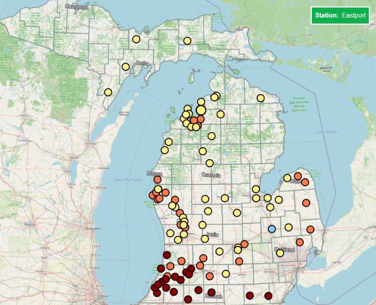 A map of Michigan with colorful points to mark severity of late blight risk.