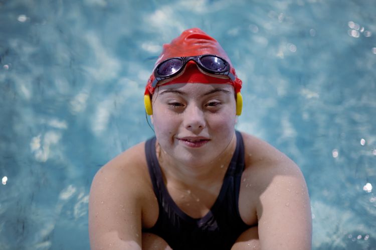 A woman in a swimming pool.