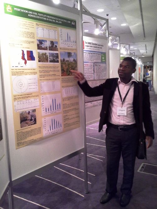 Harrington Nyirenda presents his poster.