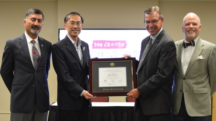 Certificate presented to speaker.