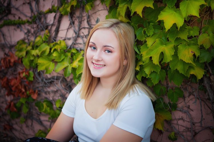 4-H member and Michigan 4-H State Awards Program winner Alexis Fisher posing for a photo.