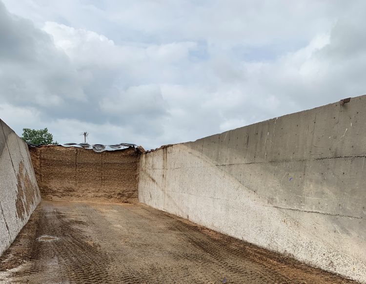 A picture of a silage drop off