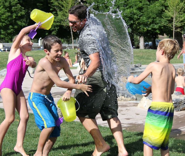 Kids playing with water outside