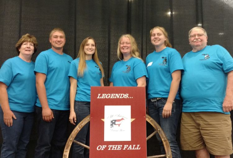 Left to right: Coach Luann Learn, Jacob Arens, Cheyenne Jakus, Madison Halfman, Miriam Cook and Coach Rodney Pennock celebrate after winning the Junior Dairy Management Contest. Photo by Rodney Pennock and Luann Learner.