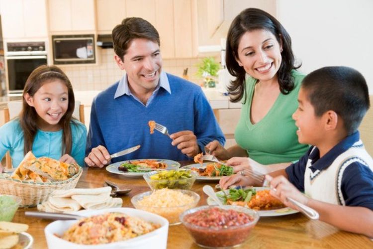 Family enjoying a meal together.