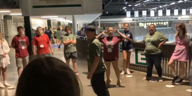 People standing around a circle