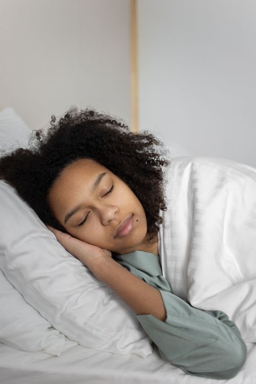 A photo of a woman sleeping.