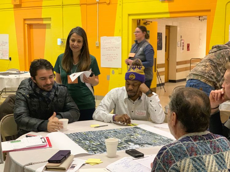 Photo of group working together at Lansing placemaking and crime prevention charrette.