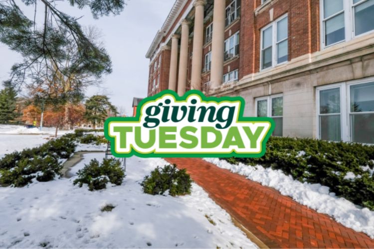Imgae of the exterior of Ag Hall with the Giving Tuesday logo in the middle of the image.