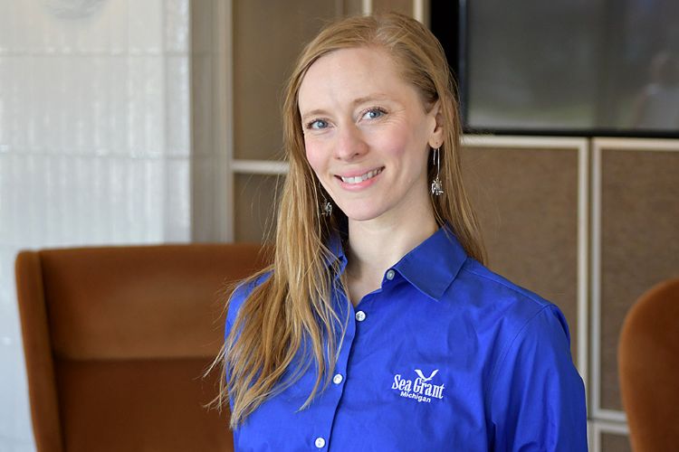 Picture of Kat Cameron wearing a blue Michigan Sea Grant shirt.