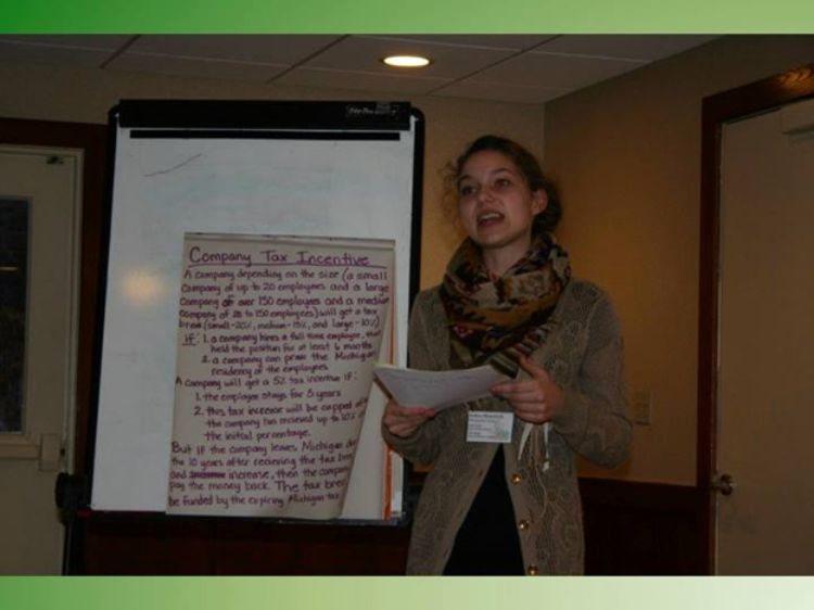 Young adult participating in the 4-H Capitol Experience with public speaking.