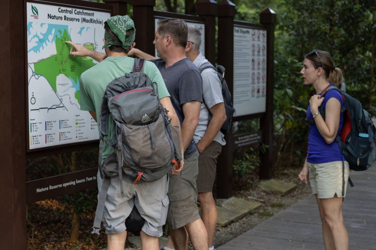 Entomology Professor Eric Benbow, center, joins other MSU Team members in Singapore for XPRIZE Rainforest competition.