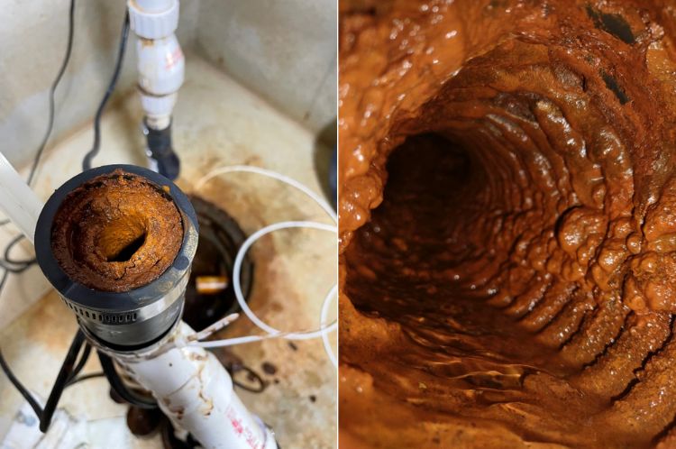 A photo of the inside of a basement drainpipe with iron ochre issues.