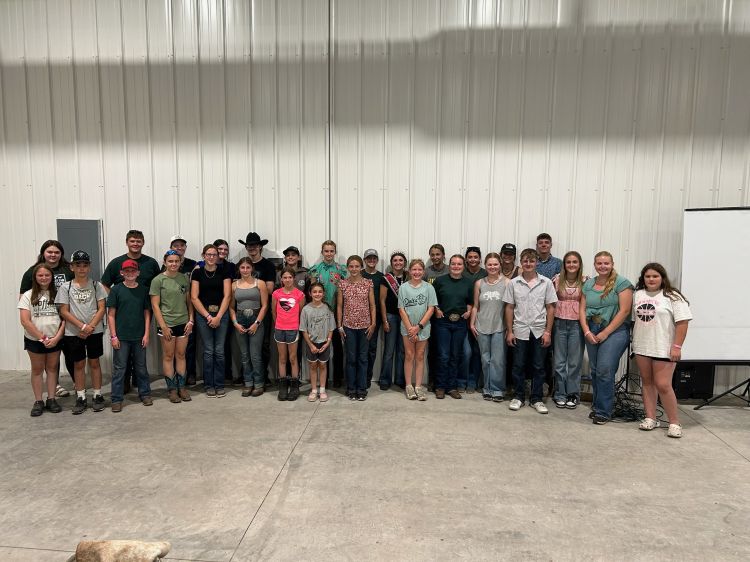 A large group of youth posing together.