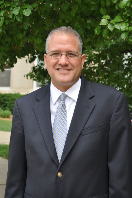 Headshot of Patrick Cudney.