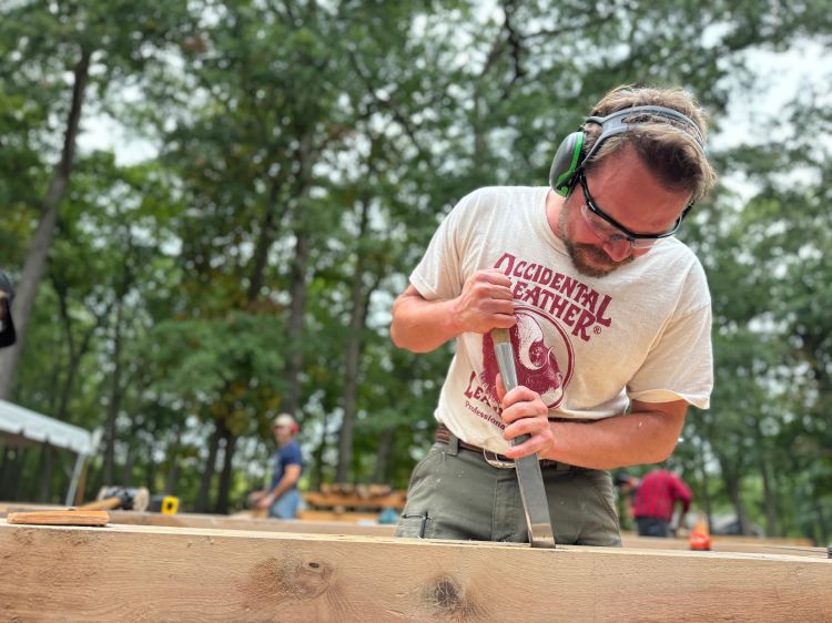Sam Beauford Woodworking Institute student working on timber framing