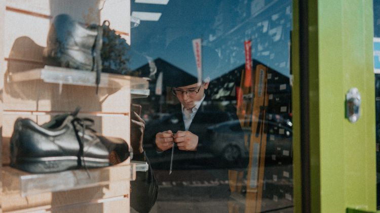 Kid shopping for shoes