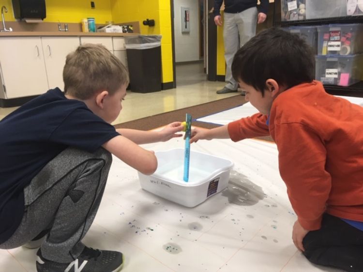 Youth conducting a science experiment