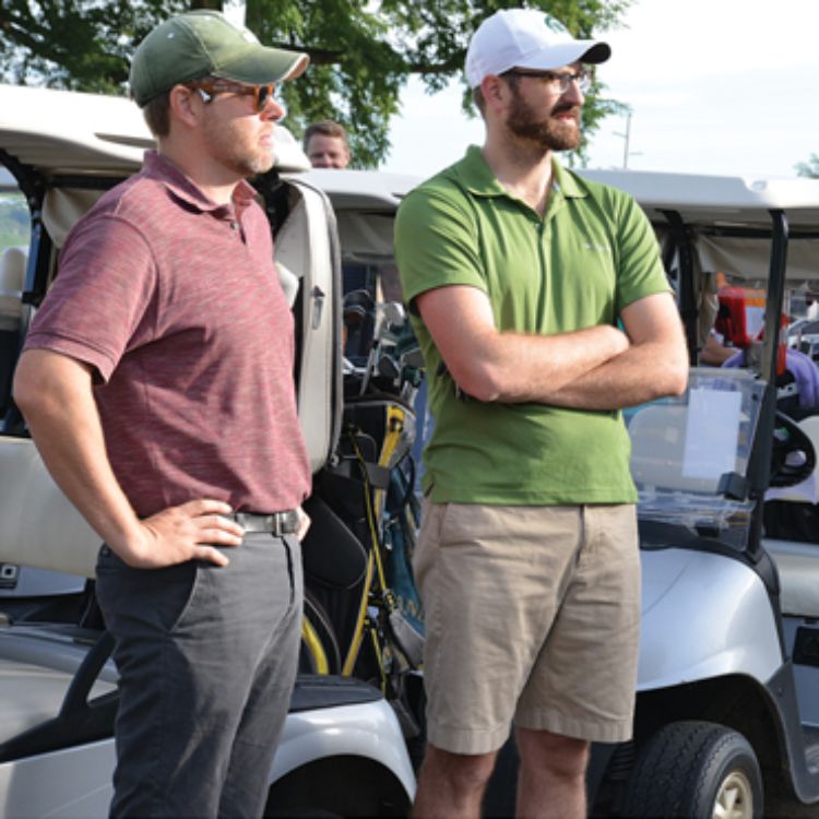 Golfers gather before the shotgun start.