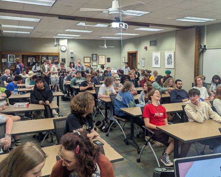 Group of students gathered in a classroom