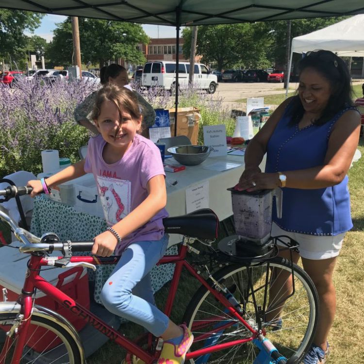 Girl on smoothie bike