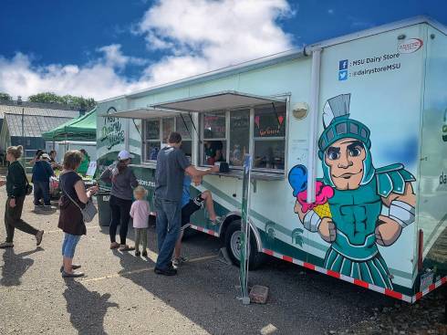 people lined up at the MSU Dairy Store ice cream trailer
