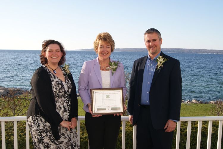 Sheila Burkhardt (center), member/government relations, and Corby Werth (right), district director, accept the 2016 Partnership Award on behalf of MMPA. Melissa Elischer (left) nominated MMPA for the award. Photo: Les Thomas.