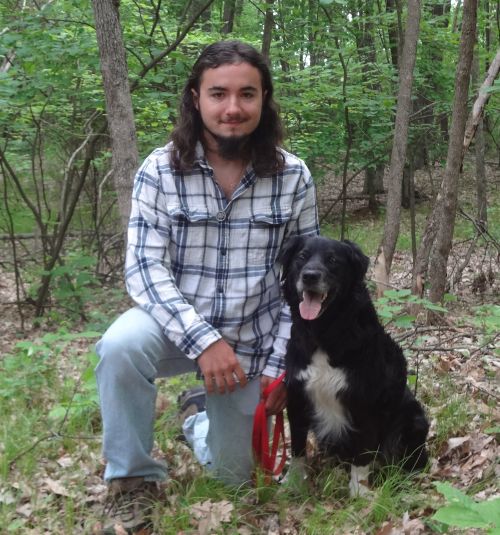 Jesse Pline and his dog Darth. Photo by Jan Brinn, MSU Extension.