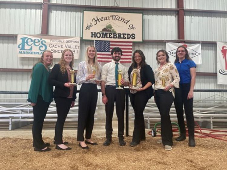 Seven MSU students at the first dairy cattle judging contest of the season.