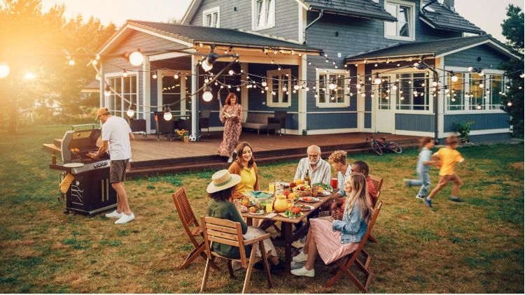 Group of people enjoying food and time outside with each other