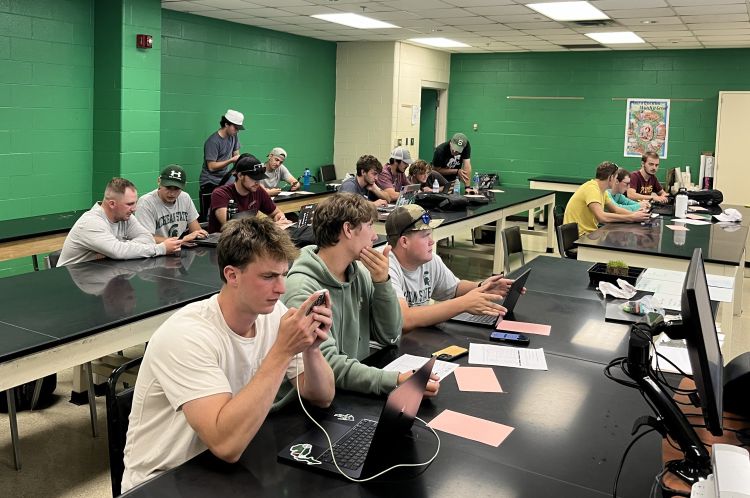 Students working on fact-checking plant IDs