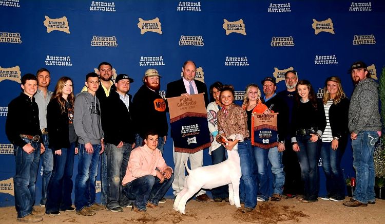 Lauren Ott with her Grand Champion Market Goat