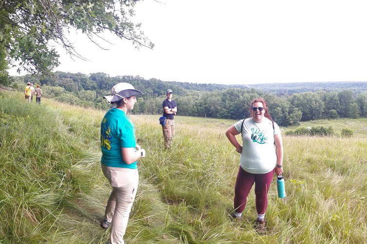 People standing in a field.