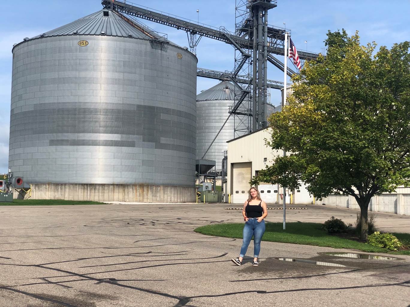 Person stands in front of POET plant
