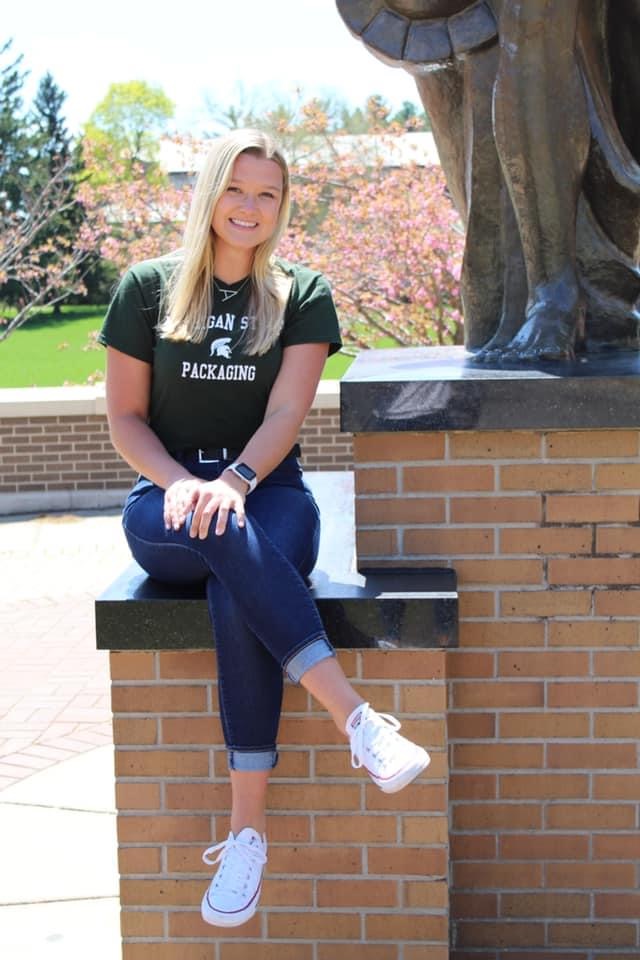 Alyxandra Hoberg on Michigan State Campus by Sparty statue